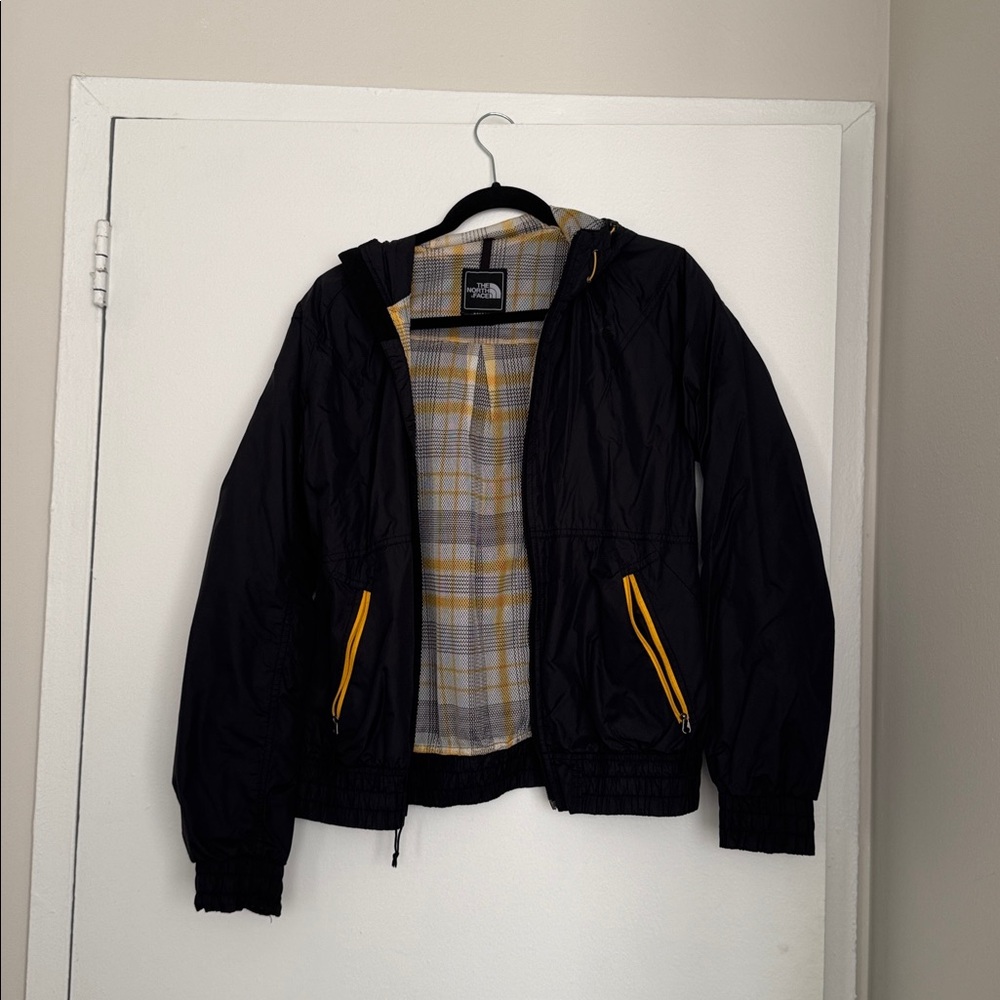 The North Face Black Rain Jacket with Yellow Zippers